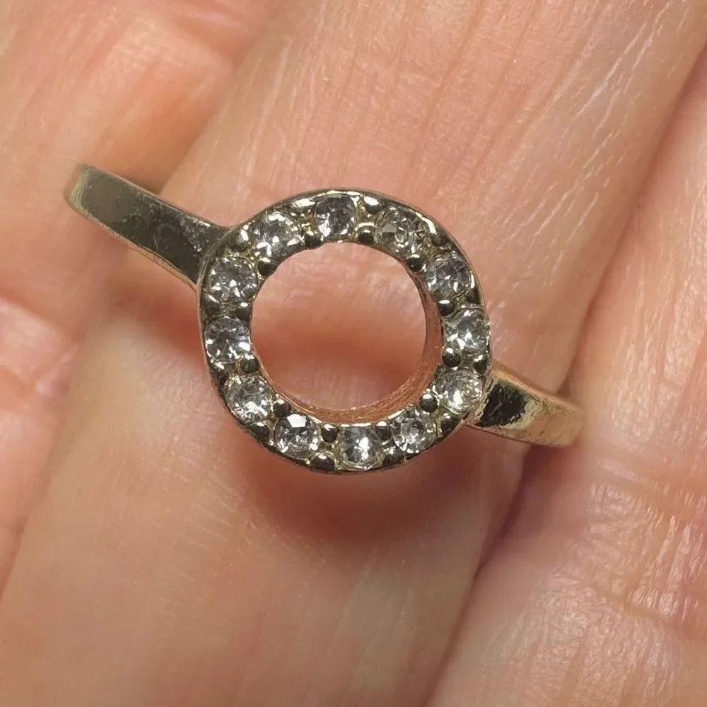 Gold tone circle rhinestone ring